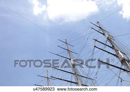 Low angle view of three masted ship against sky View Large Photo Image Stock Image - Low angle view of three masted ship against sky. Fotosearch
