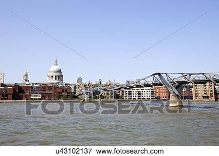 Millennium Bridge, River Thames and St Paul's Cathedral during the day View Large Photo Image Stock Photo - Millennium Bridge, River Thames and St Paul's Cathedral during the day. Fotosearch