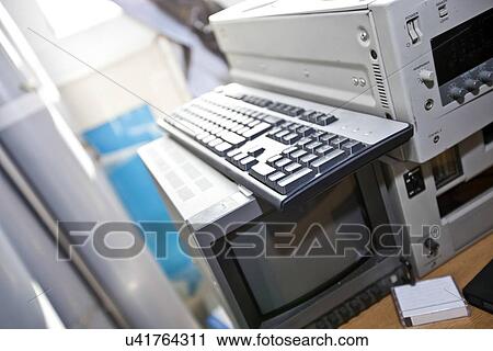 Stock Image - Monitor and VCR in television station. Fotosearch