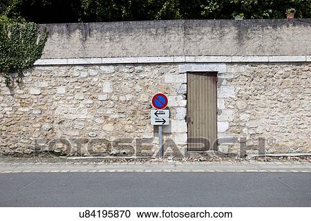 No parking sign against stone wall View Large Photo Image Stock Image - No parking sign against stone wall. Fotosearch