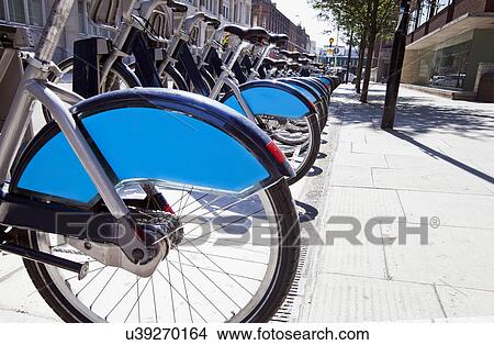 Public Rental Bicycles in a Line, London, UK View Large Photo Image Picture - Public Rental Bicycles in a Line, London, UK. Fotosearch