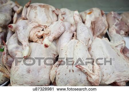Raw chickens in supermarket View Large Photo Image Stock Image - Raw chickens in supermarket. Fotosearch