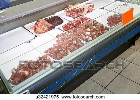 Red meat on display in supermarket View Large Photo Image Stock Photography - Red meat on display in supermarket. Fotosearch