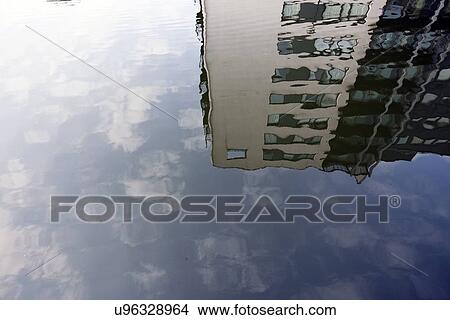 Picture - Reflecting houses in water. Fotosearch
