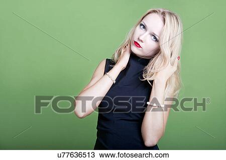 Sexy blonde businesswoman with hands in her hair View Large Photo Image Stock Image - Sexy blonde businesswoman with hands in her hair. Fotosearch