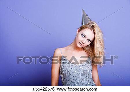 Sexy blonde party girl wearing silver dress and party hat View Large Photo Image Stock Photograph - Sexy blonde party girl wearing silver dress and party hat. Fotosearch