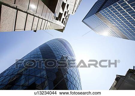 Skyscraper and gherkin View Large Photo Image Picture - Skyscraper and gherkin. Fotosearch