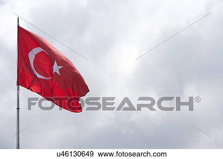 Turkish flag flying in the air View Large Photo Image Stock Photo - Turkish flag flying in the air. Fotosearch