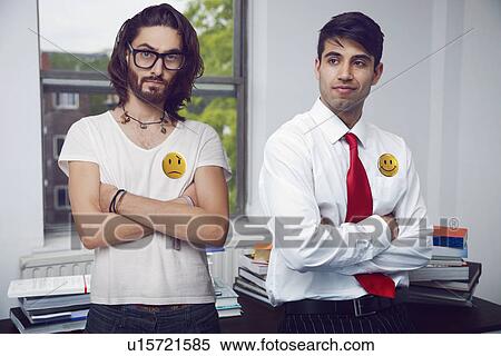 Two men in an office folding their arms View Large Photo Image Stock Photography - Two men in an office folding their arms. Fotosearch