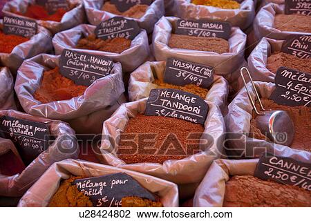 Stock Image - Variety of ingredients on display in store. Fotosearch