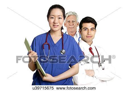 Various Doctors standing in front of white background View Large Photo Image Stock Photography - Various Doctors standing in front of white background . Fotosearch