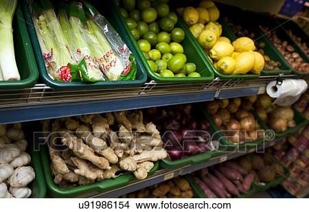 Various vegetables on display in grocery store View Large Photo Image Picture - Various vegetables on display in grocery store. Fotosearch