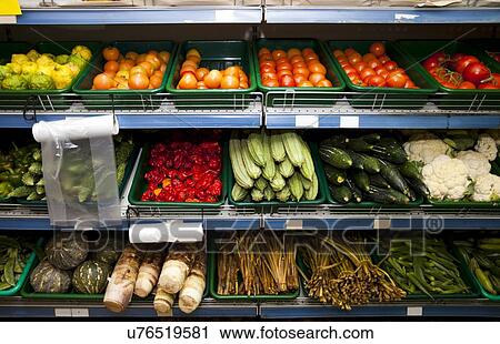 Various vegetables on shelves in grocery store View Large Photo Image Stock Image - Various vegetables on shelves in grocery store. Fotosearch