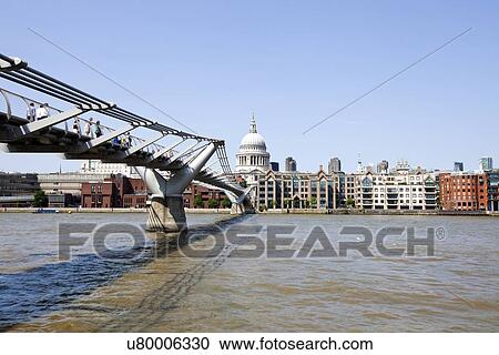 View of Millennium Bridge with view of City of London in the Background View Large Photo Image Stock Image - View of Millennium Bridge with view of City of London in the Background. Fotosearch