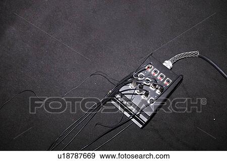 Stock Photo - Wires attached to electric box in television studio. Fotosearch