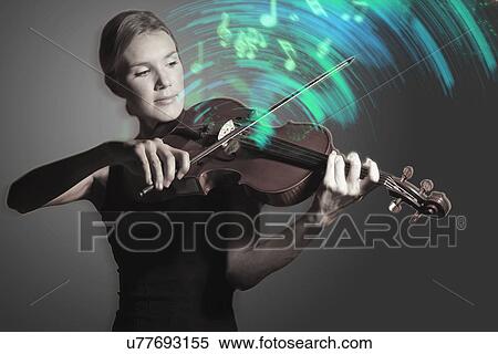 Stock Photography - Woman playing Violin. Fotosearch