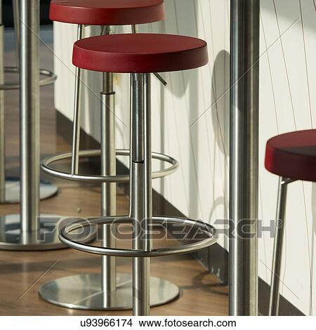 Picture - Bar stools at a bar counter, Chicago, Cook County, Illinois, USA. Fotosearch