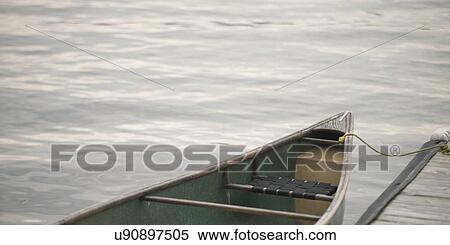 Boat at a dock, Lake Of The Woods, Keewatin, Ontario, Canada View Large Photo Image Stock Photography - Boat at a dock, Lake Of The Woods, Keewatin, Ontario, Canada. Fotosearch