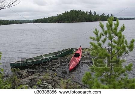 Boats at Lake of The Woods, Keewatin, Ontario, Canada View Large Photo Image Stock Photograph - Boats at Lake of The Woods, Keewatin, Ontario, Canada. Fotosearch