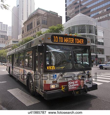 Stock Photo - Bus moving on a road in Chicago, Cook County, Illinois, USA. Fotosearch