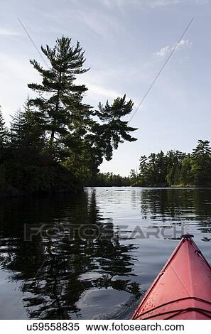 Stock Photography - Canoe on Lake of The Woods, Keewatin, Ontario, Canada. Fotosearch