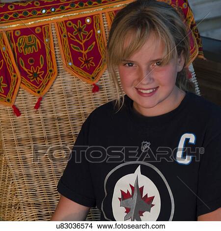 Picture - Close-up of a girl smiling, Lake of The Woods, Keewatin, Ontario, Canada. Fotosearch