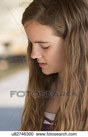 Close-up of a girl thinking, Lake of The Woods, Keewatin, Ontario, Canada View Large Photo Image Stock Image - Close-up of a girl thinking, Lake of The Woods, Keewatin, Ontario, Canada. Fotosearch