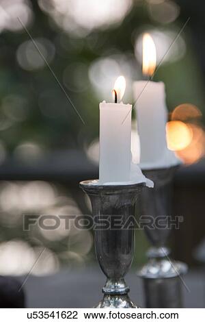 Close-up of burning candles on a candle stand, Lake of The Woods, Keewatin, Ontario, Canada View Large Photo Image Stock Image - Close-up of burning candles on a candle stand, Lake of The Woods, Keewatin, Ontario, Canada. Fotosearch