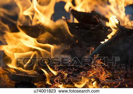 Stock Image - Close-up of campfire, Lake Of The Woods, Keewatin, Ontario, Canada. Fotosearch