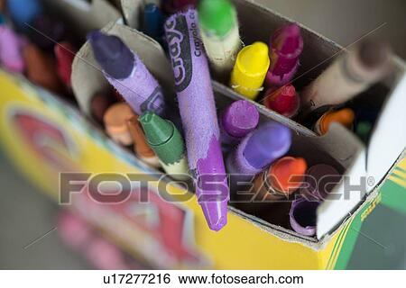 Stock Photograph - Close-up of colored crayons in a box. Fotosearch