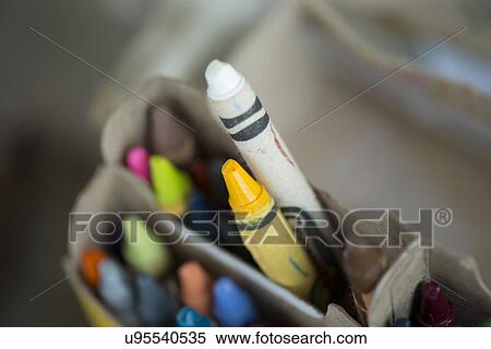 Stock Photography - Close-up of colored crayons in a box. Fotosearch