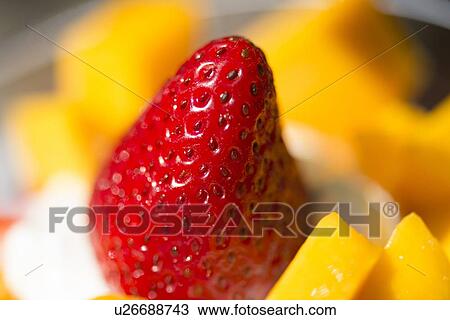 Stock Image - Close-up of strawberry and fruit, Ontario, Canada. Fotosearch
