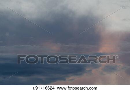 Picture - Clouds in the sky, Lake of The Woods, Keewatin, Ontario, Canada. Fotosearch