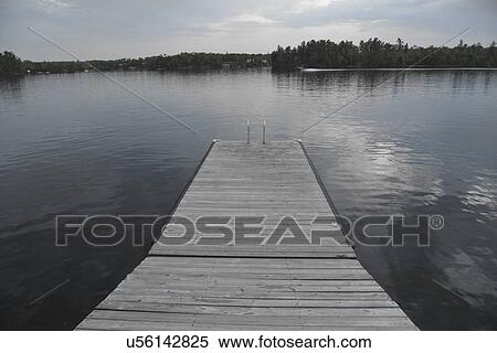 Stock Photography - Dock at Lake of The Woods, Keewatin, Ontario, Canada. Fotosearch