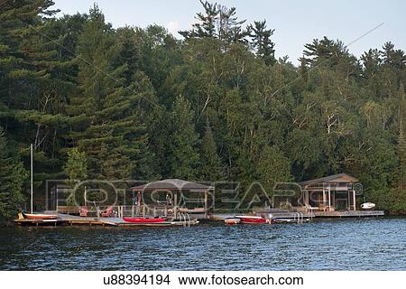 Dock at the lakeside, Lake of The Woods, Keewatin, Ontario, Canada View Large Photo Image Picture - Dock at the lakeside, Lake of The Woods, Keewatin, Ontario, Canada. Fotosearch