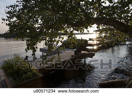 Dock at the lakeside, Lake of The Woods, Keewatin, Ontario, Canada View Large Photo Image Picture - Dock at the lakeside, Lake of The Woods, Keewatin, Ontario, Canada. Fotosearch