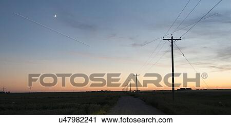 Electric cable line in a prairie field, Manitoba, Canada View Large Photo Image Stock Image - Electric cable line in a prairie field, Manitoba, Canada. Fotosearch