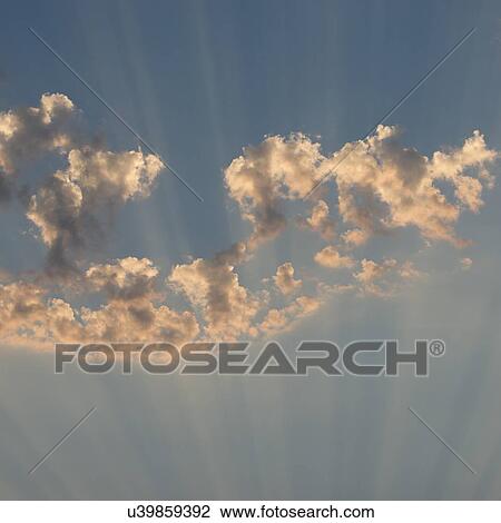 Stock Image - Fluffy Clouds in the sky, Ontario, Canada. Fotosearch