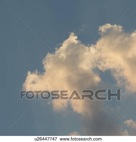 Stock Photo - Fluffy Clouds in the sky, Ontario, Canada. Fotosearch
