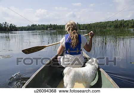Girl boating at Lake of The Woods, Keewatin, Ontario, Canada View Large Photo Image Stock Photo - Girl boating at Lake of The Woods, Keewatin, Ontario, Canada. Fotosearch