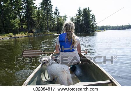 Girl boating at Lake of The Woods, Keewatin, Ontario, Canada View Large Photo Image Stock Photo - Girl boating at Lake of The Woods, Keewatin, Ontario, Canada. Fotosearch