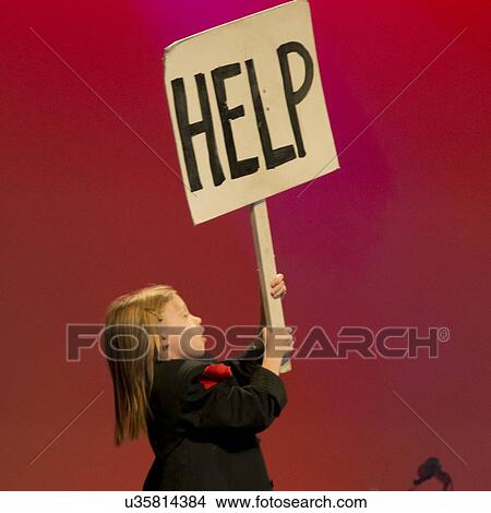 Girl holding a help sign banner at Hughes American Family Theater, Branson, Taney County, Missouri, USA View Large Photo Image Picture - Girl holding a help sign banner at Hughes American Family Theater, Branson, Taney County, Missouri, USA. Fotosearch