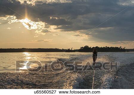 Girl waterskiing in Lake of The Woods, Keewatin, Ontario, Canada View Large Photo Image Stock Photo - Girl waterskiing in Lake of The Woods, Keewatin, Ontario, Canada. Fotosearch