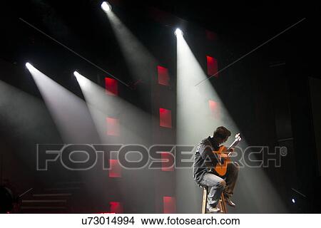 Guitarist performing at Hughes American Family Theater, Branson, Taney County, Missouri, USA View Large Photo Image Picture - Guitarist performing at Hughes American Family Theater, Branson, Taney County, Missouri, USA. Fotosearch