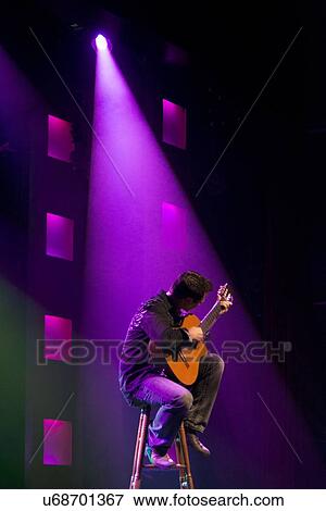 Stock Photo - Guitarist performing at Hughes American Family Theater, Branson, Taney County, Missouri, USA. Fotosearch