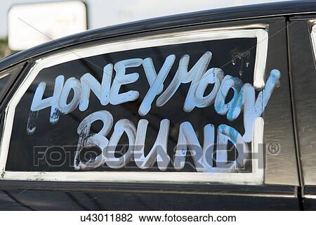 Honeymoon Bound text on a car window, Branson, Taney County, Missouri, USA View Large Photo Image Stock Image - Honeymoon Bound text on a car window, Branson, Taney County, Missouri, USA. Fotosearch