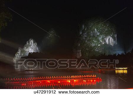 Impressions light show in the Yulong River, Yangshuo, Guilin, Guangxi Province, China View Large Photo Image Stock Image - Impressions light show in the Yulong River, Yangshuo, Guilin, Guangxi Province, China. Fotosearch
