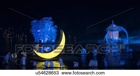 Stock Image - Impressions light show in the Yulong River, Yangshuo, Guilin, Guangxi Province, China. Fotosearch