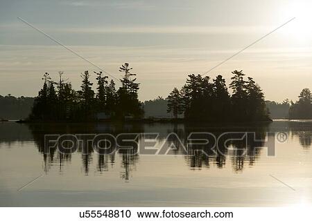 Lake at sunset, Lake Of The Woods, Keewatin, Ontario, Canada View Large Photo Image Stock Image - Lake at sunset, Lake Of The Woods, Keewatin, Ontario, Canada. Fotosearch