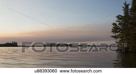 Lake at sunset, Lake Of The Woods, Keewatin, Ontario, Canada View Large Photo Image Stock Image - Lake at sunset, Lake Of The Woods, Keewatin, Ontario, Canada. Fotosearch